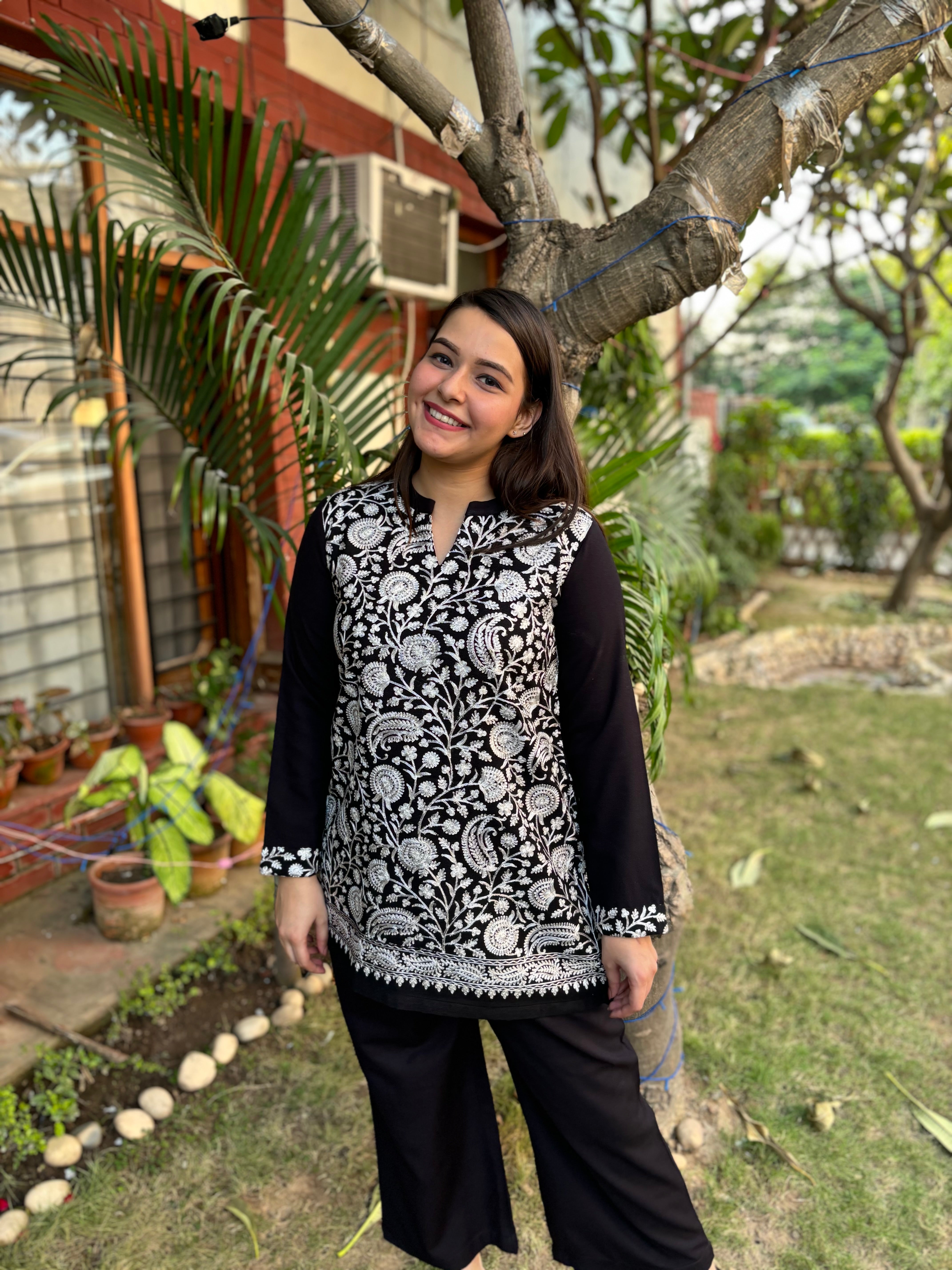 White Kanni embroidered short kurti (woollen)