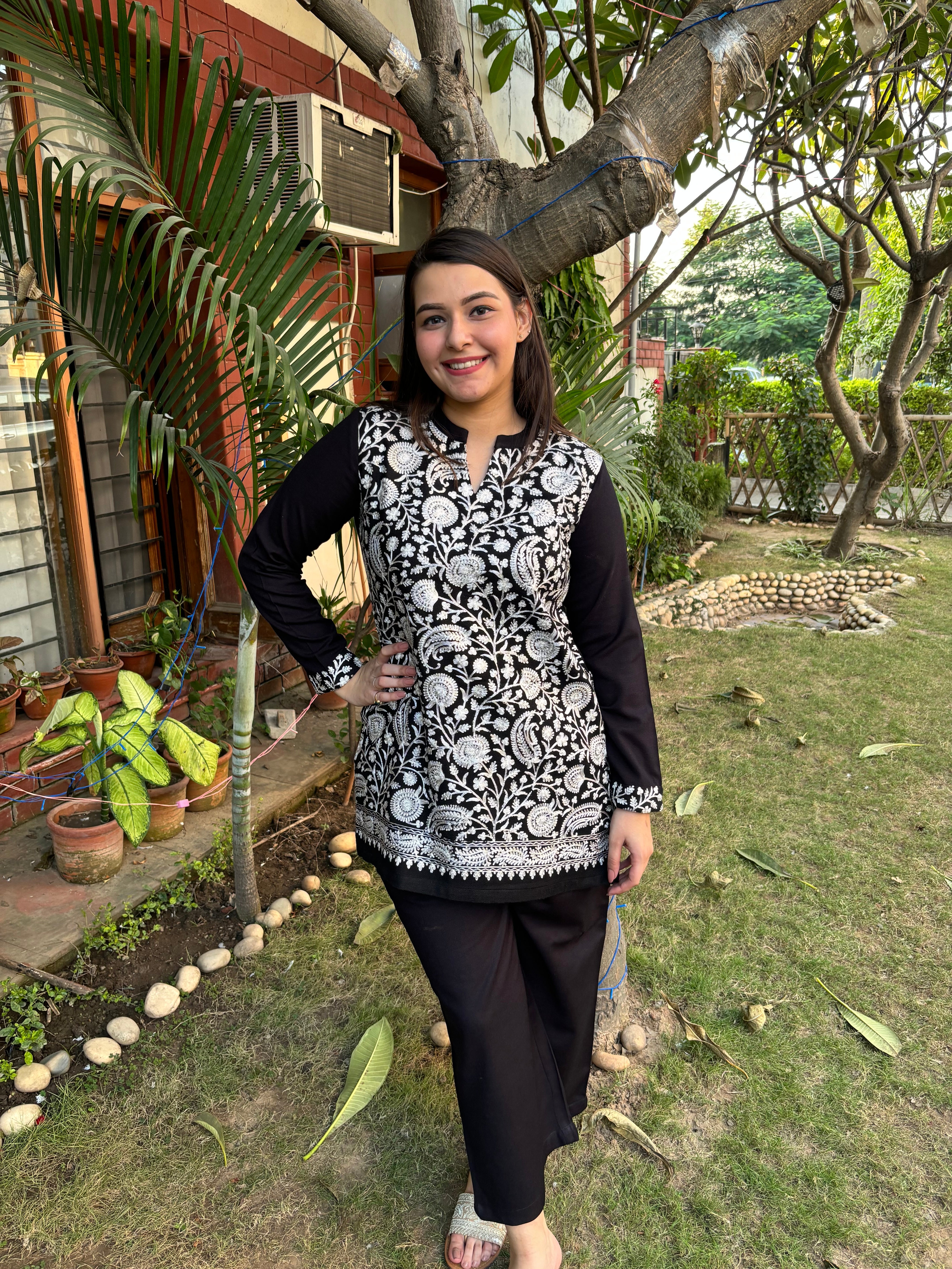 White Kanni embroidered short kurti (woollen)