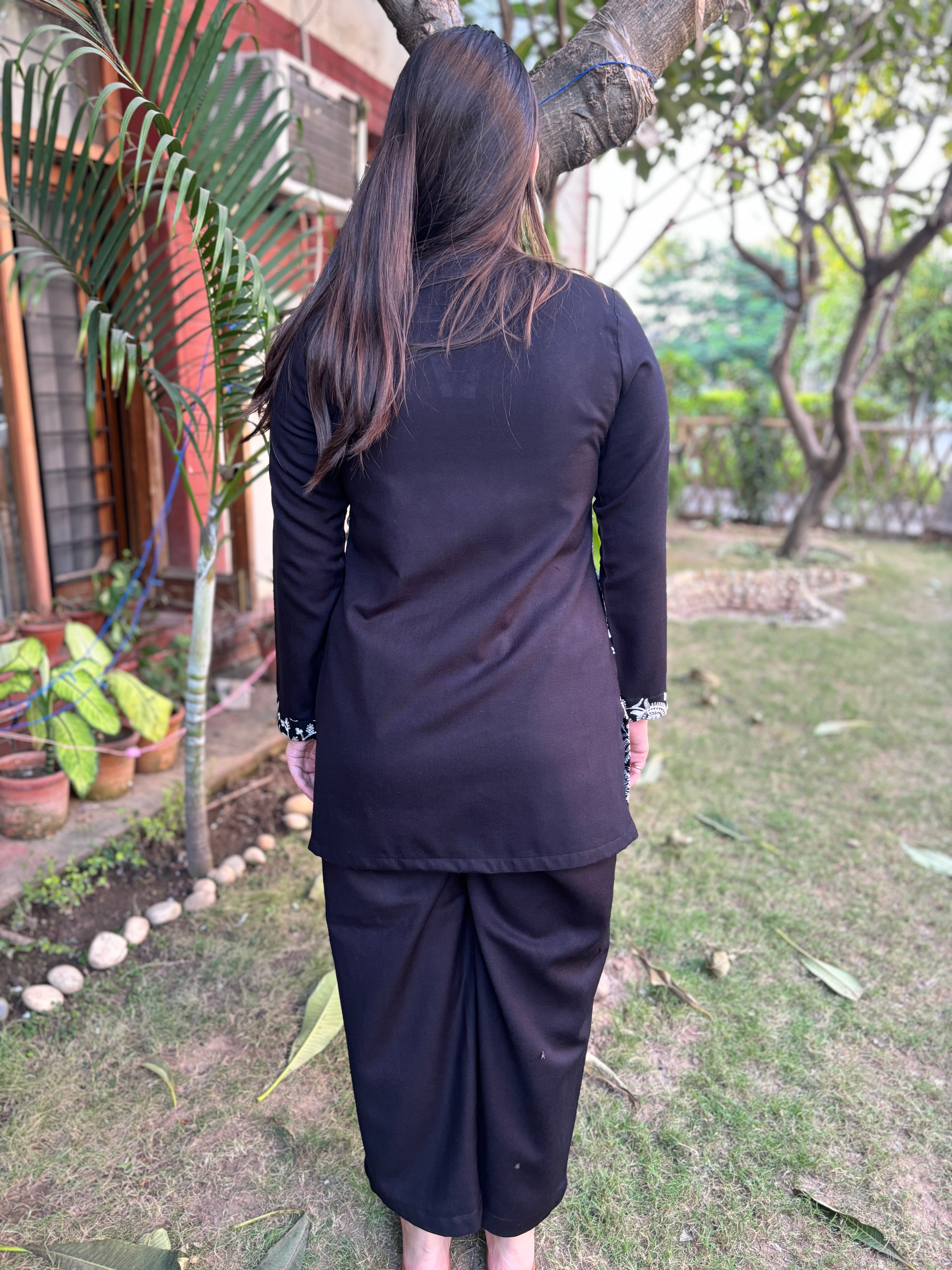 White Kanni embroidered short kurti (woollen)