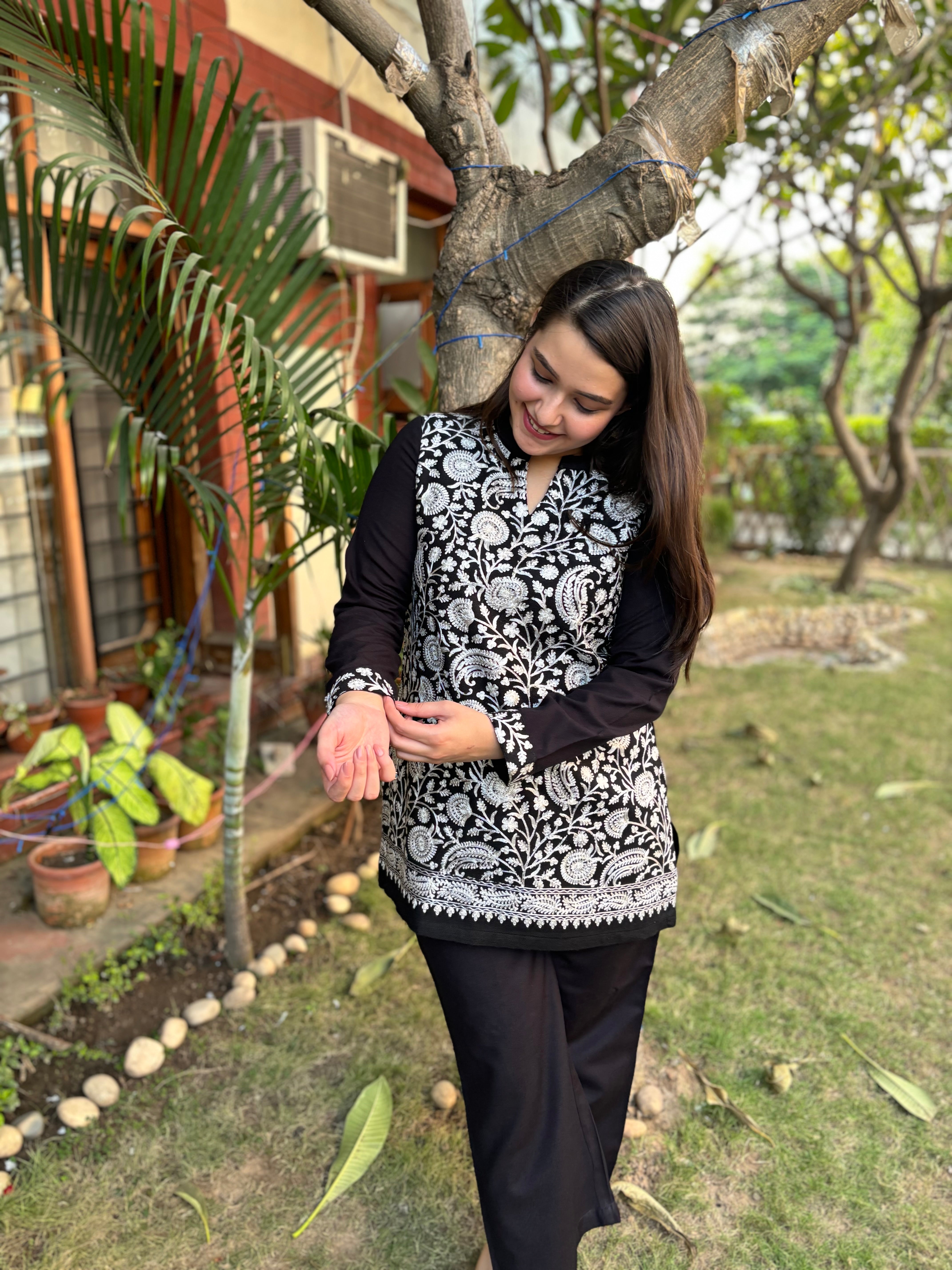 White Kanni embroidered short kurti (woollen)