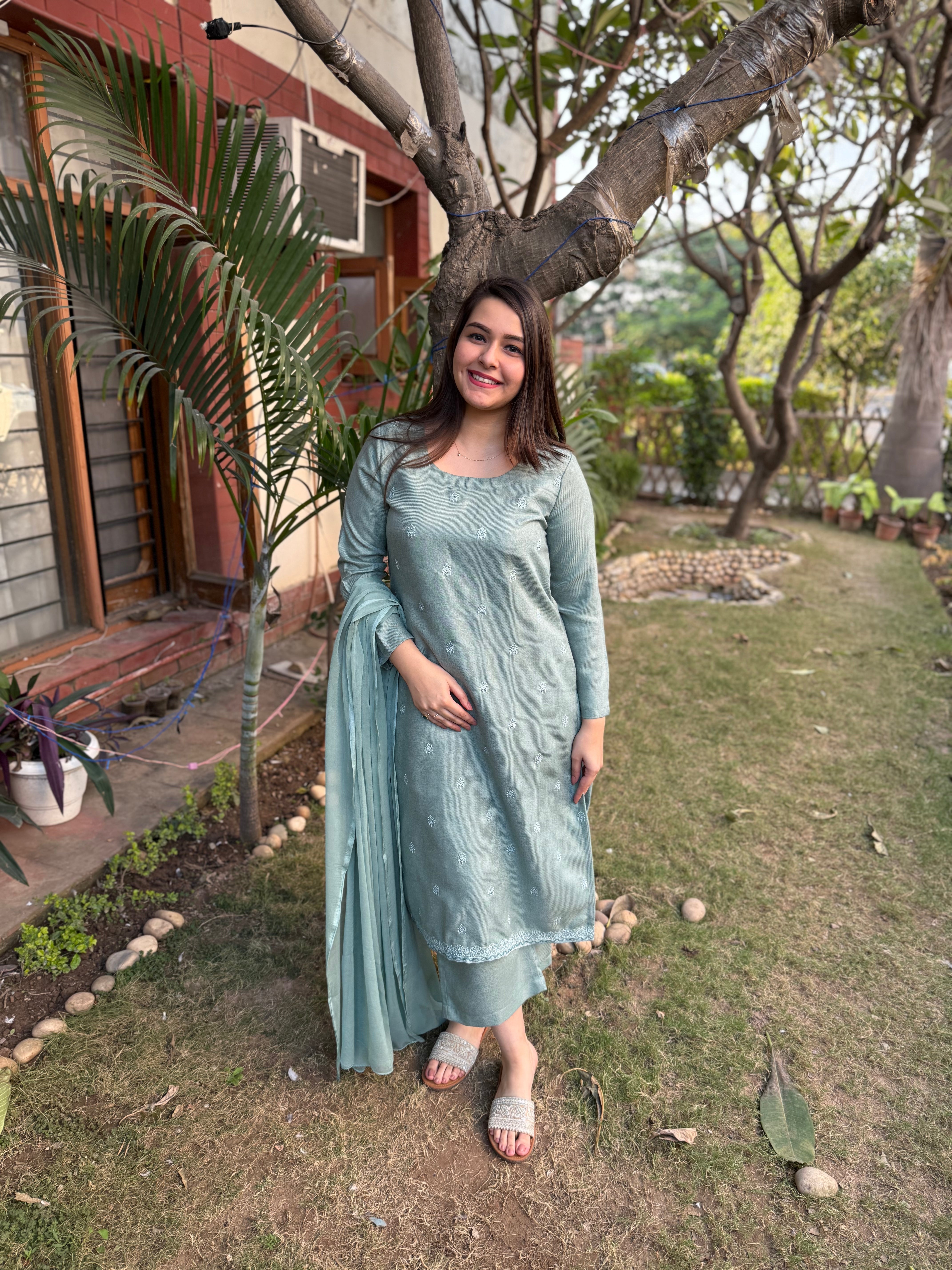 Pista green embroidered woollen suit set